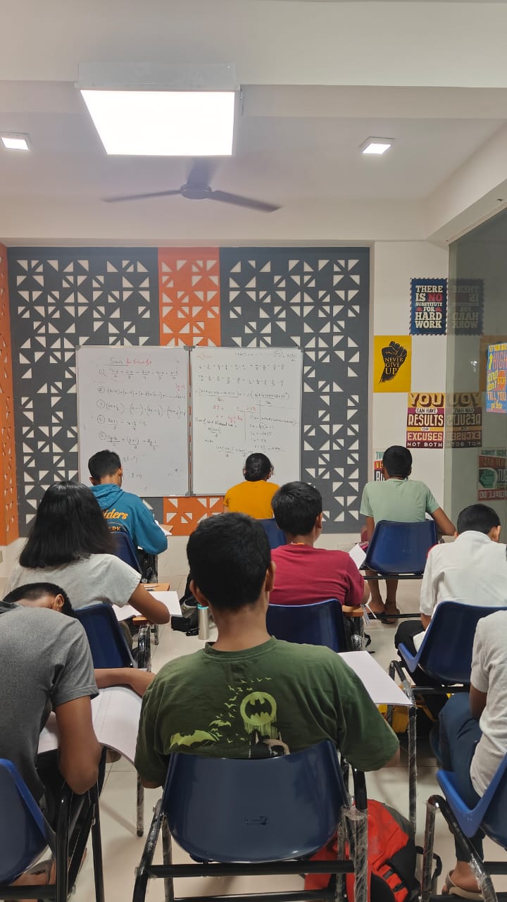 Students working through problems in class